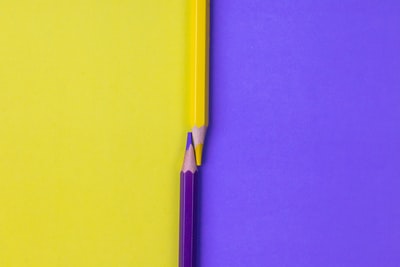Yellow on the surface of the yellow and black pencil
